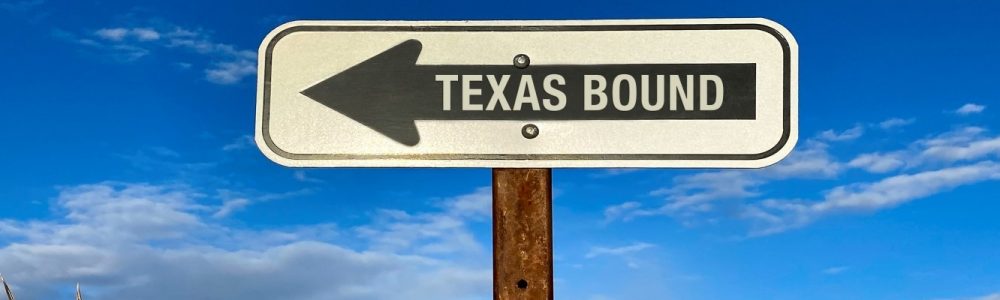 resized_FI_Getty_Texas-Bound-road-sign-blue-sky